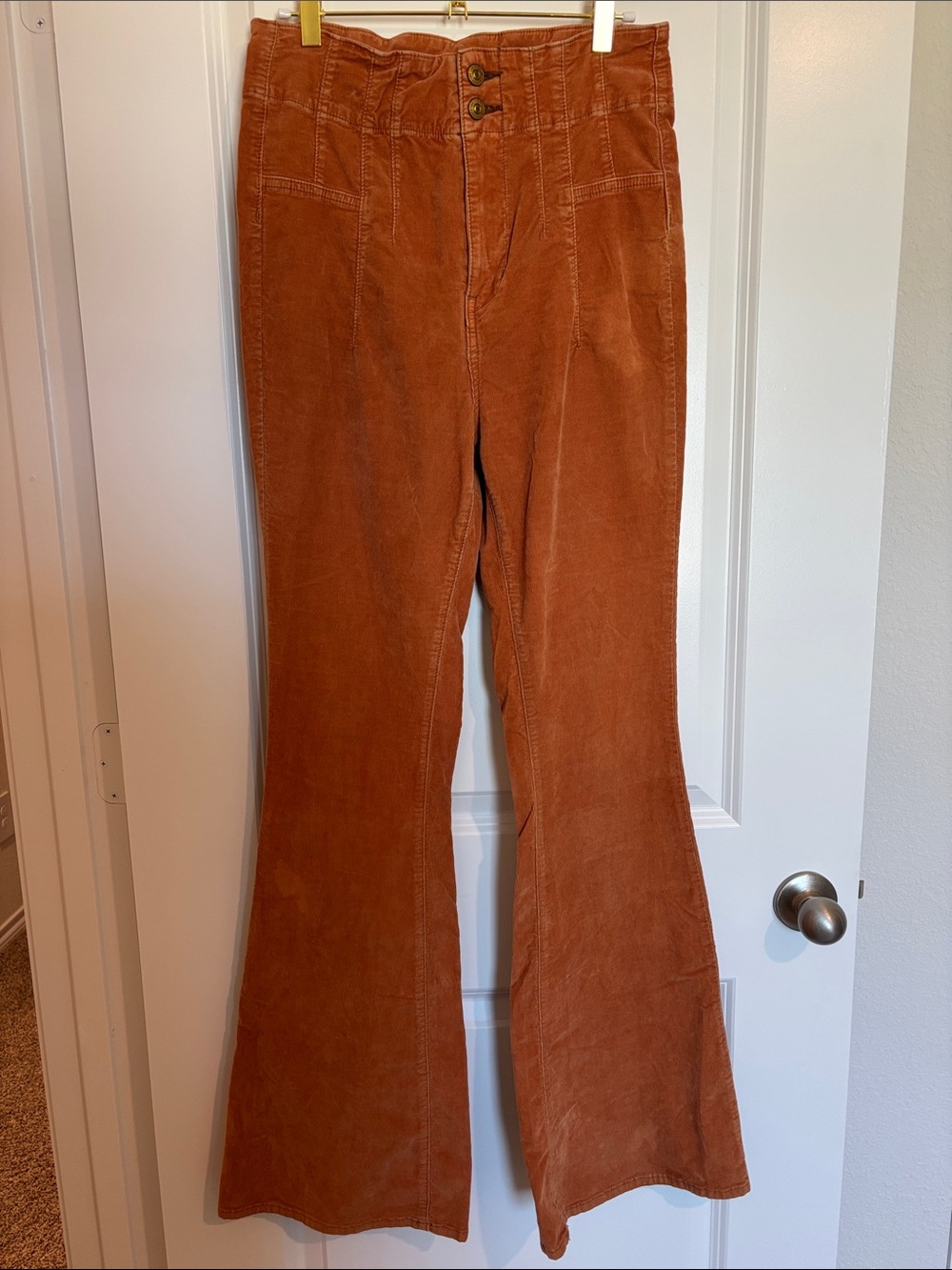 We The Free Corduroy Flare Pants in Rust